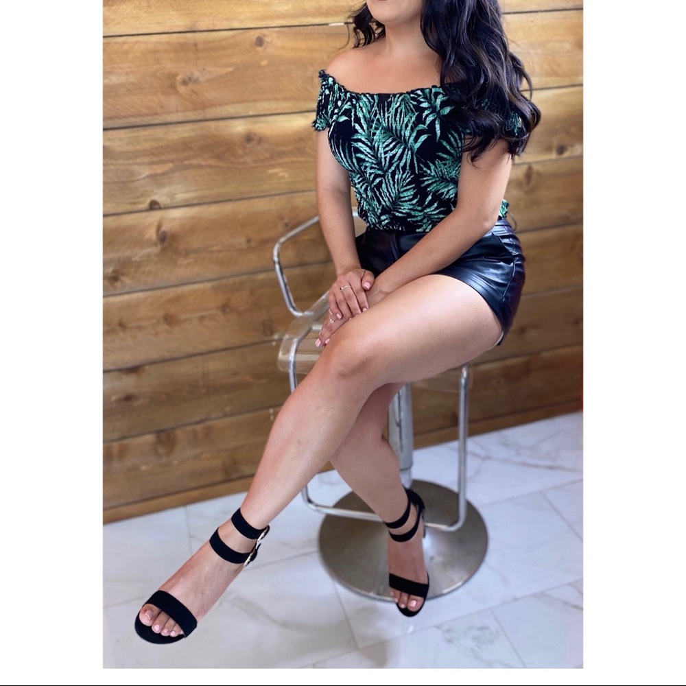 Top / leather pants shorts / heels